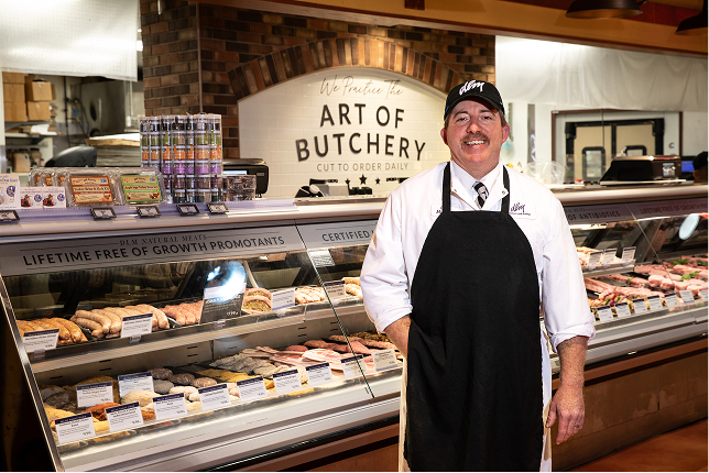 Butcher preparing meat