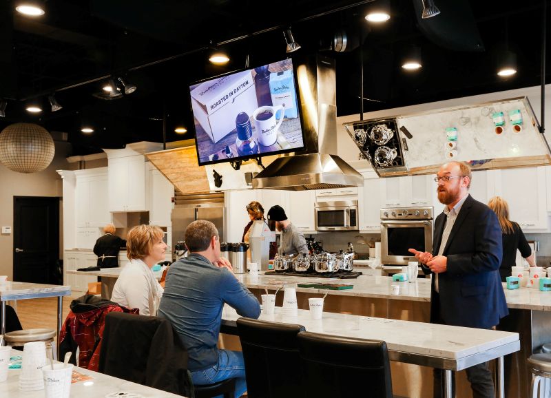 DLM customers attending a lecture at the Culinary Center